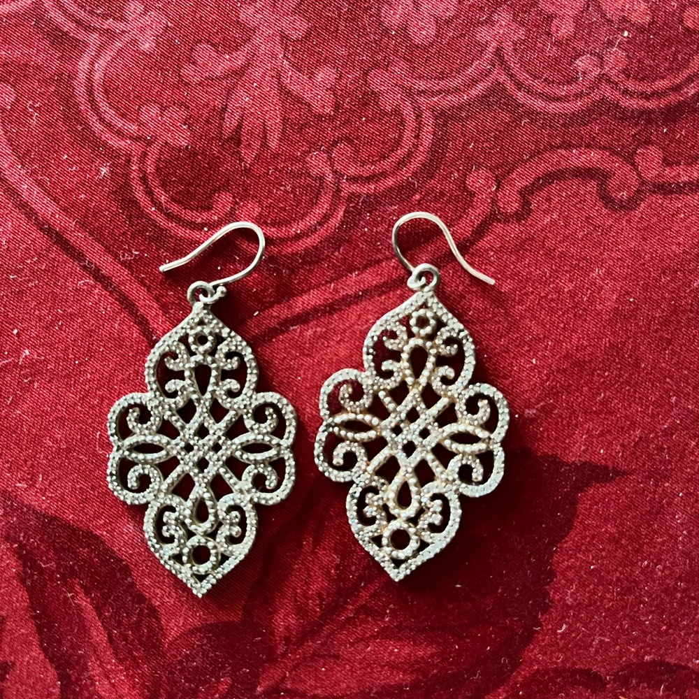 Filigree drop earrings.